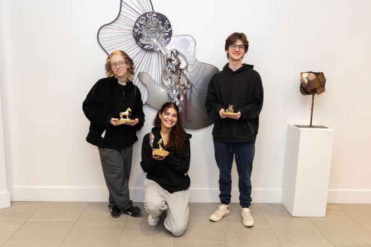 three students with awards