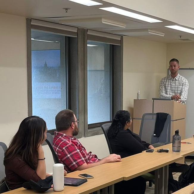 Tripp Strawbridge presenting to the Cluster on Language Research group