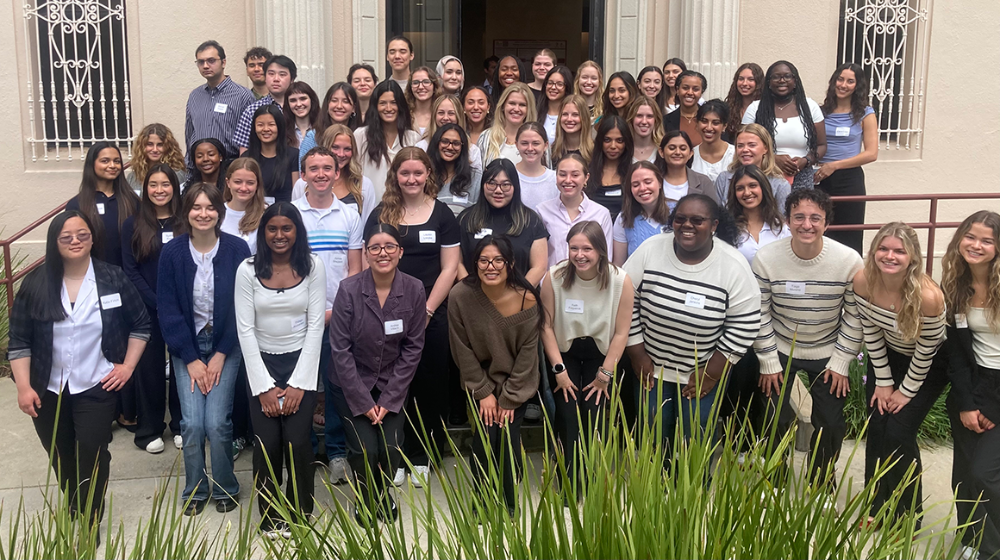 Student scholars from Psychology and Public Health in front of Alumni Science, following the 2nd Annual undergraduate research conference that bears the building's name.