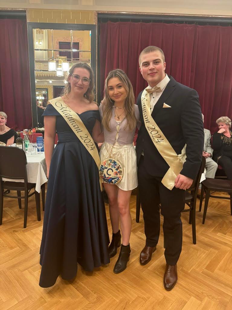 Teresa with students at prom