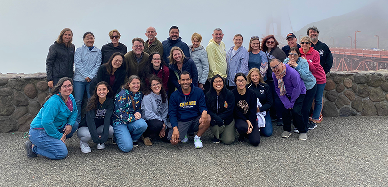 Francesca D'Urzo and fellow participants in San Francisco with the Golden Gate Bridge in the background