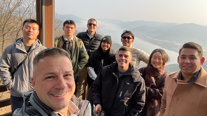 LTC Von Bargen wtih students and hosts