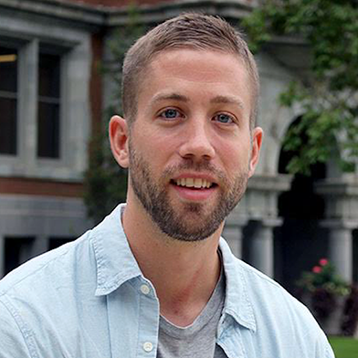 A person in front of a building labeled 'Tripp Strawbridge.'