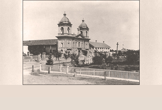 Alt text: Black and white photo of a building with domed towers labeled 'SC-03 1870'.