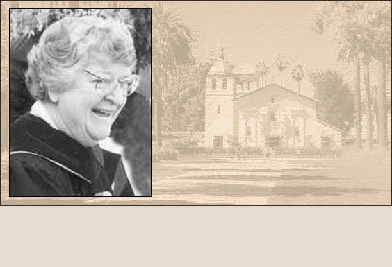 Black-and-white photo of a person and a historical building.