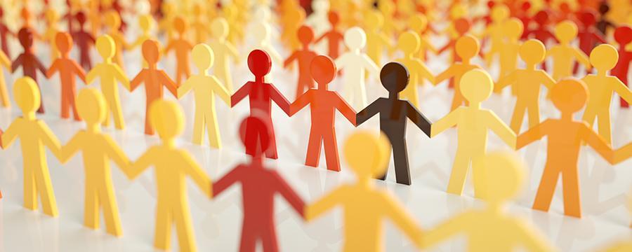 paper doll cutouts in various colors holding hands