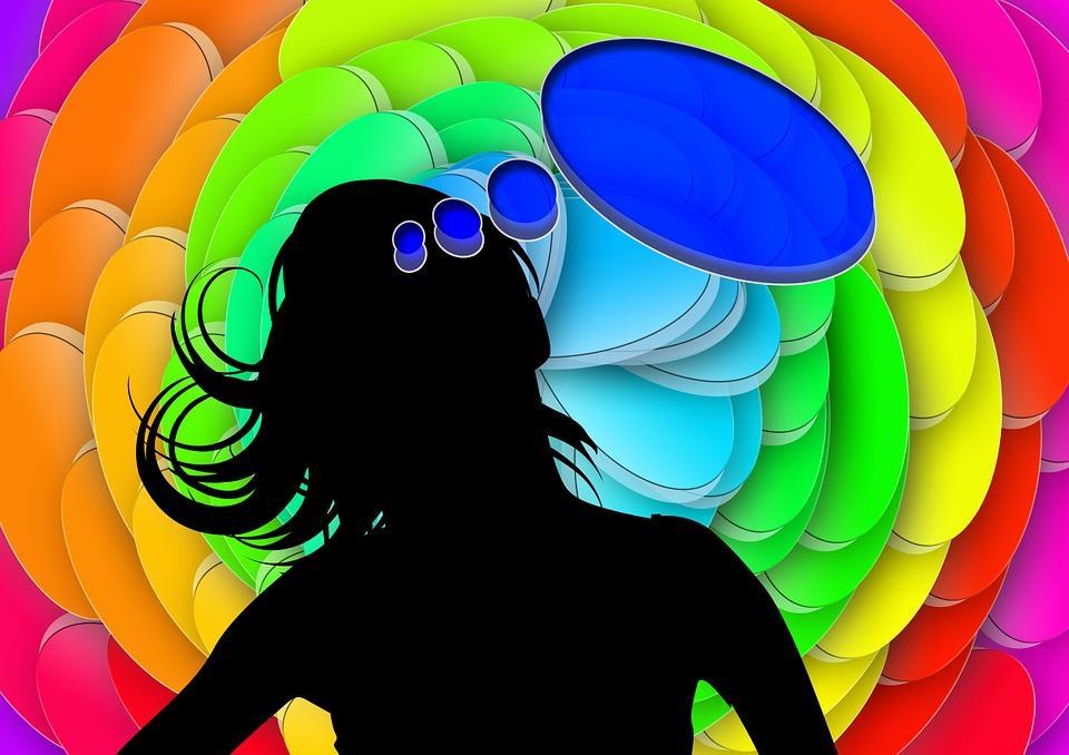 Image of silouette with empty word bubble on rainbow background