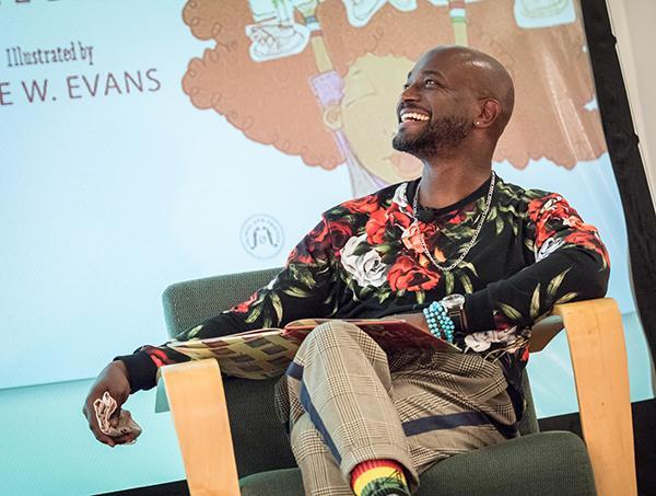 Taye Diggs in front of screen 