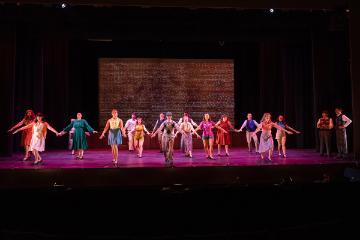 Men and women onstage auditioning for the musical 42nd Street
