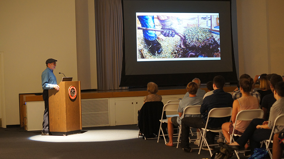 Artist Chester Arnold giving a lecture.