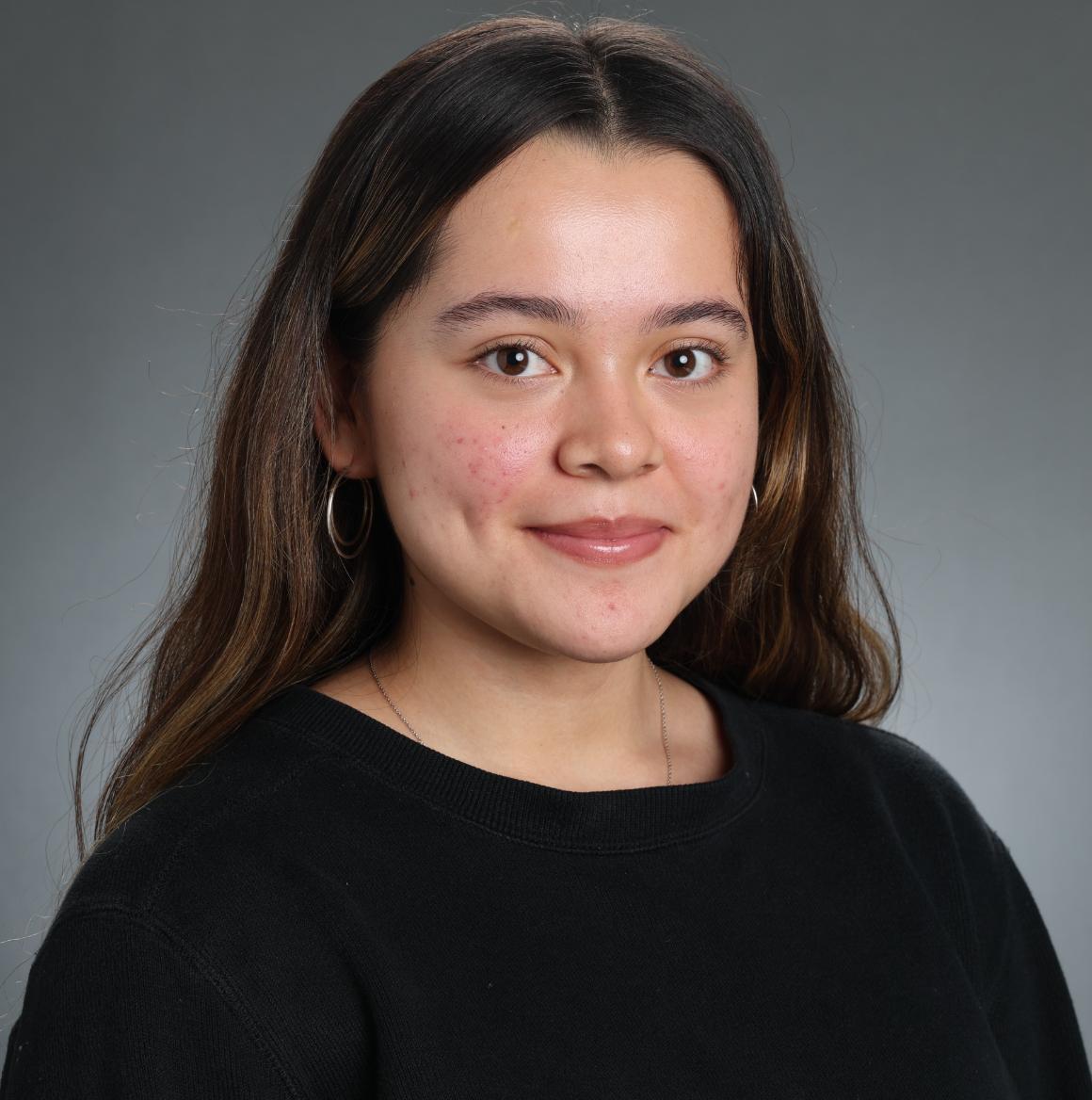 A woman with blue top