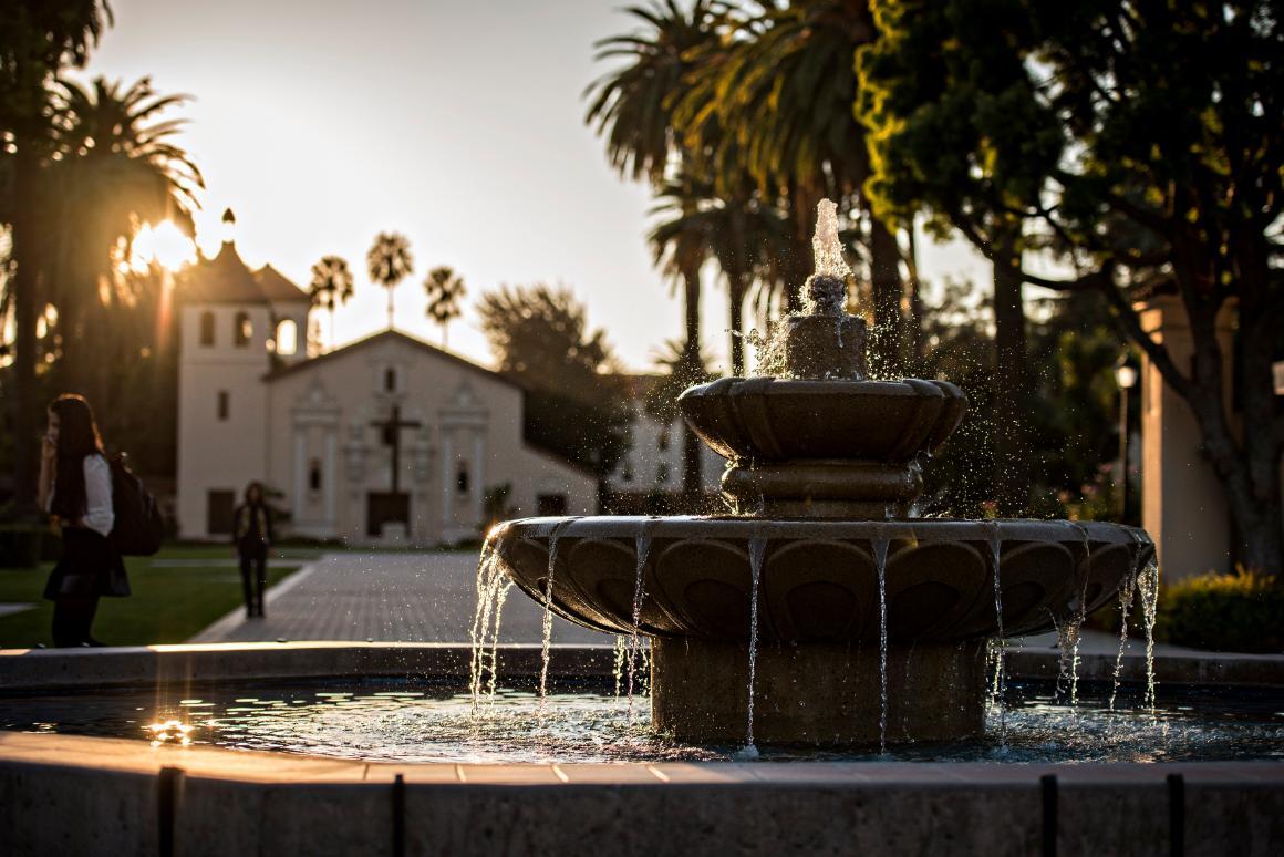 Photo of fountain and church 