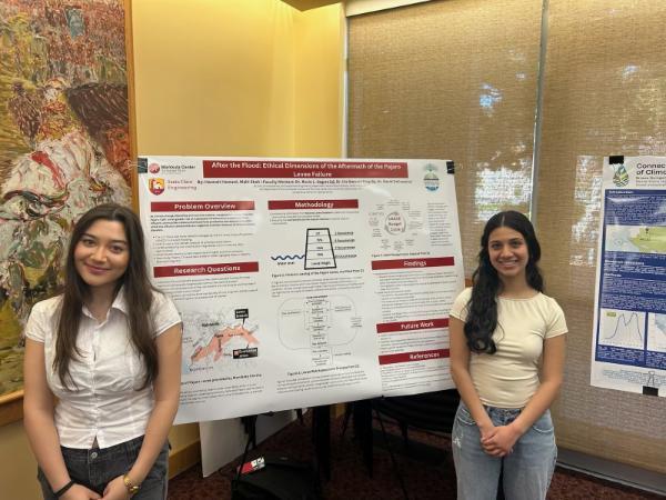 Hannah Hamawi ‘27, and Mahi Shah ‘28, presenting their project at the SCU Sust