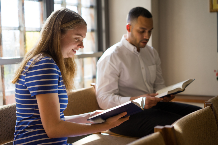Two students reading at the Jesuit School of Theology