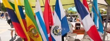 Multiple international flags displayed at an event called 