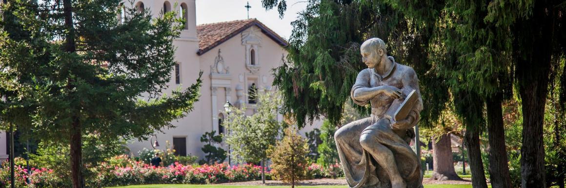 Ignatian Spirituality Banner - St. Ignatius Statue 