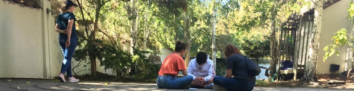 Students on SJ immersion in reflection