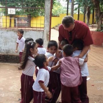 ANthony Hascheff on Immersion hugging kids