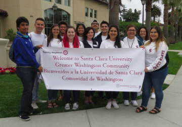 TN Team with banner to welcome Washington neighborhood