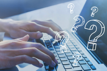 Image of hands typing on the laptop 