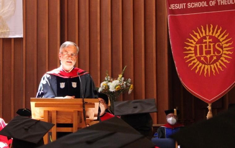 JST commencement speaker Arthur Holder at lectern image link to story