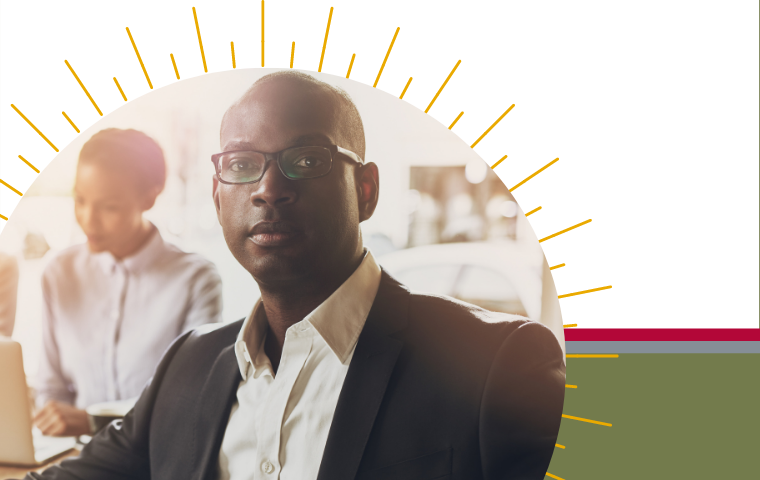 Male Black Executive foreground w/ Female to Left