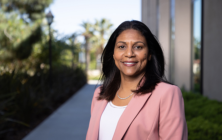 Headshot of Law Sr. Director DEI Theadora Pina image link to story