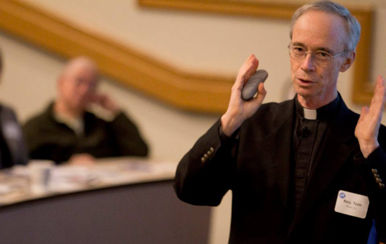 Thomas Reese speaks to an audience image link to story