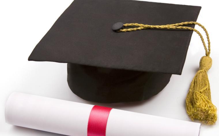 Graduation cap and diploma image link to story