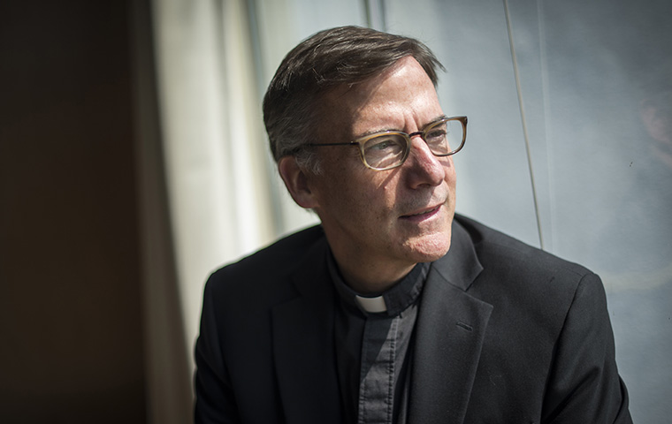 Kevin O'Brien looks out of a window