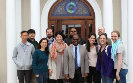 Students standing in front of doorway