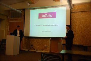 People presenting a slide titled 