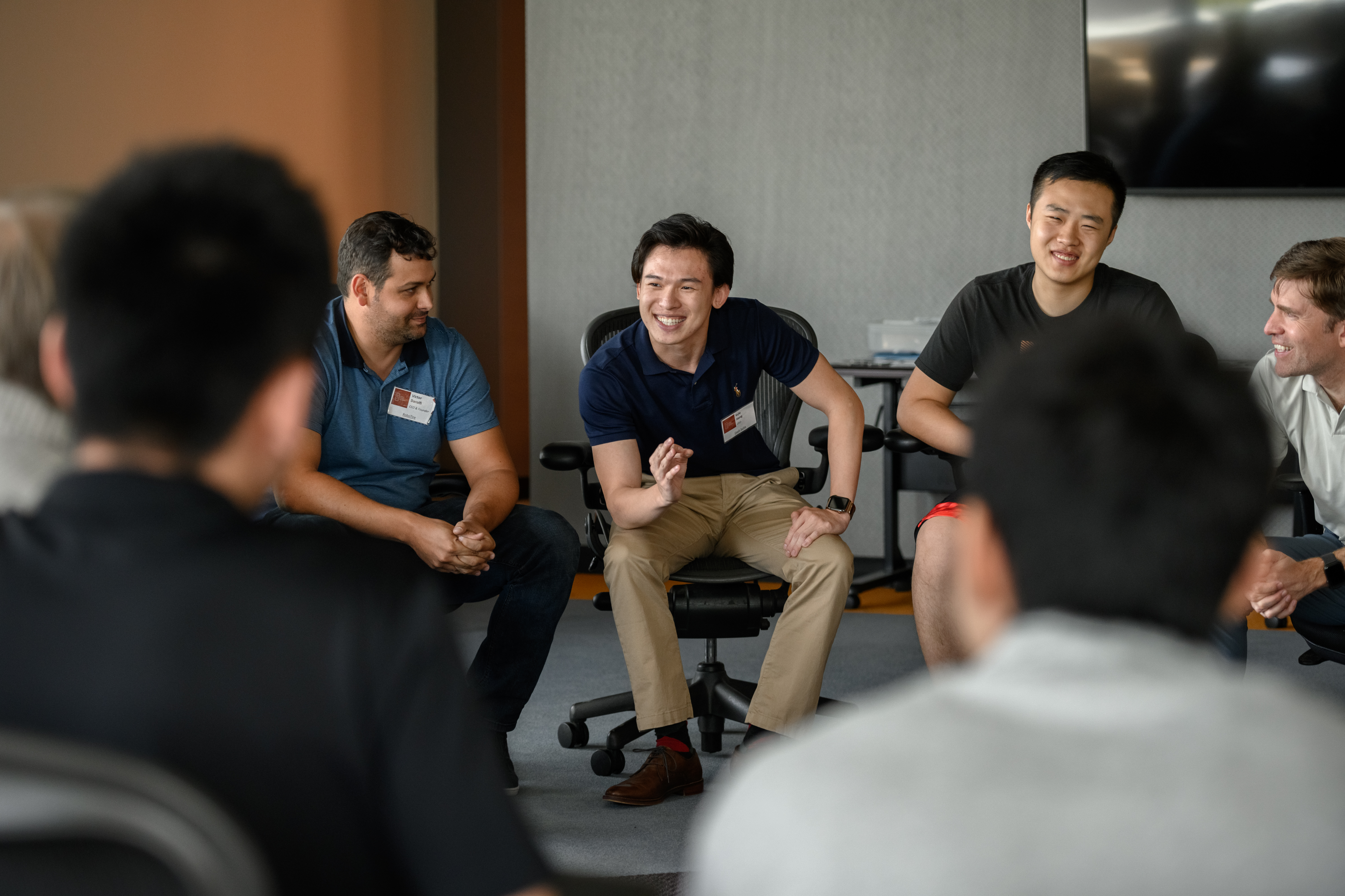A small group of people having a discussion.