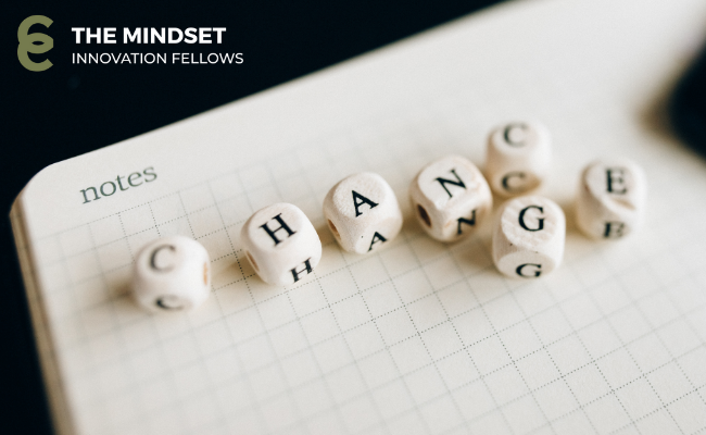 Six keyboard keycaps spelling 