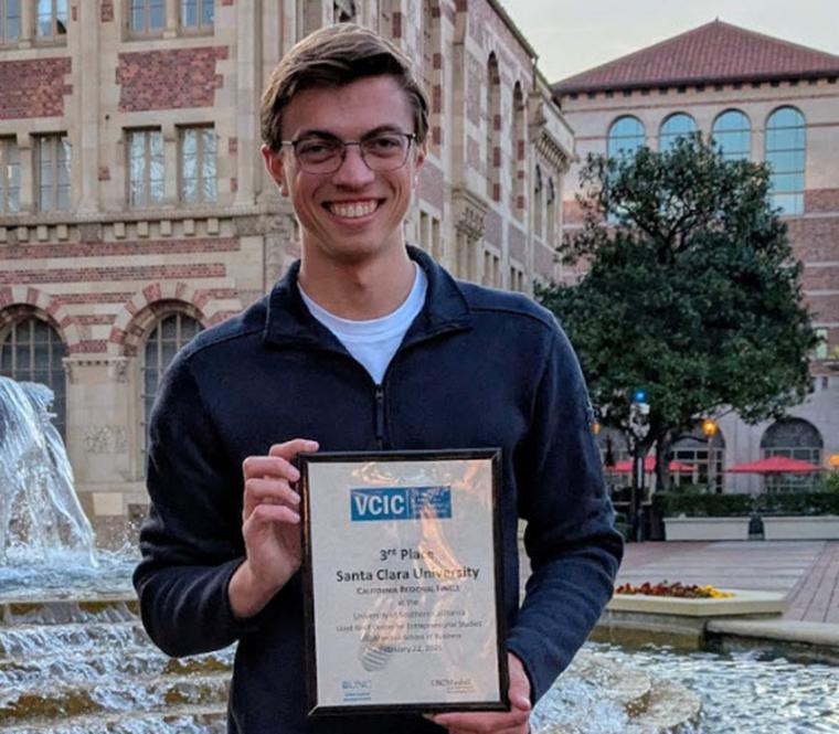 Jackson Dwelle holding 3rd place certificate for VCIC Competition 