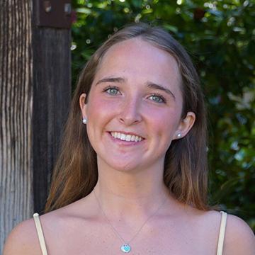 Woman smiling outdoors