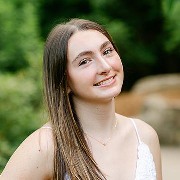 Woman smiling outdoors