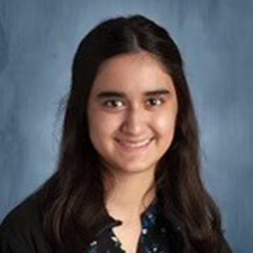 Woman in black top smiling