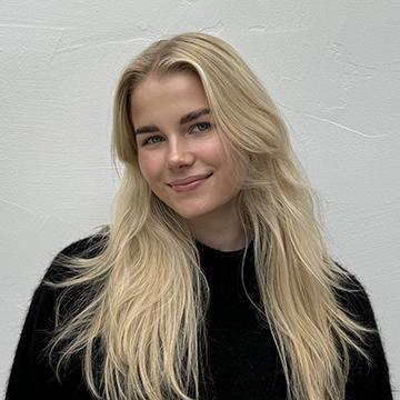 Woman in black shirt smiling