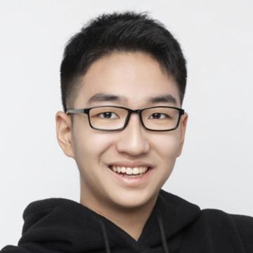 Man with glasses smiling
