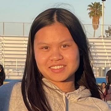 Woman smiling outdoors