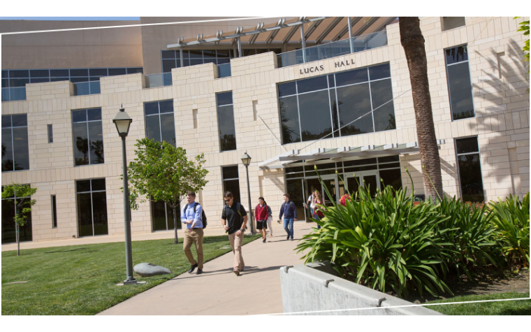 Students walking in and out of Lucas Hall