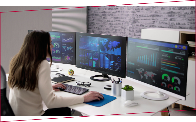 Leavey School of Business students analyzing charts