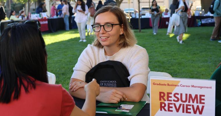 Leavey graduate business student at a resume review session image link to article