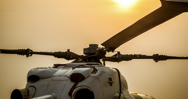 Military helicopter in the hazy sun