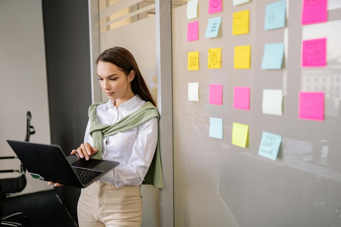 Business professional planning corporate communications