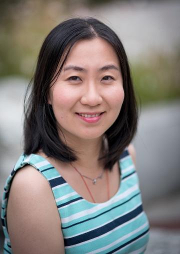 Xiaoyun Yang, MSF alumna, outside Lucas Hall