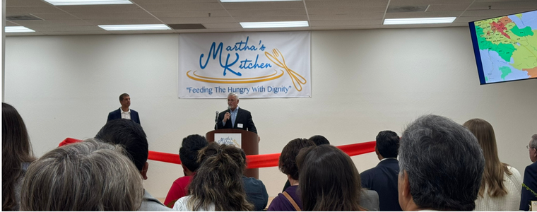 Photo of Drew Starbird Speaking at Martha's Kitchen Grand Opening