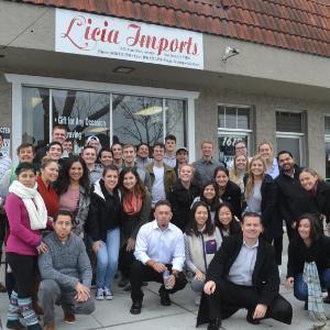 Group of students in front of local store