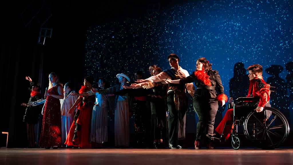 Performers in sync in a play